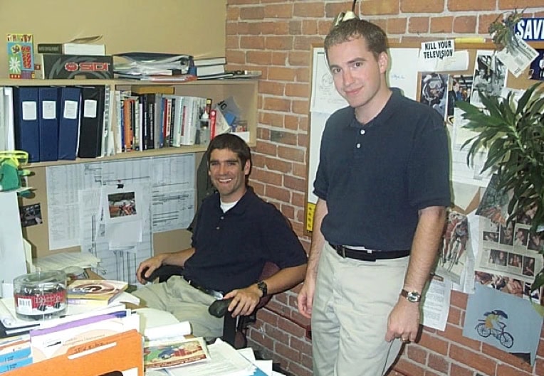 Old photo of Gordon Ross and Darren Gibbons as part of Our Story page content