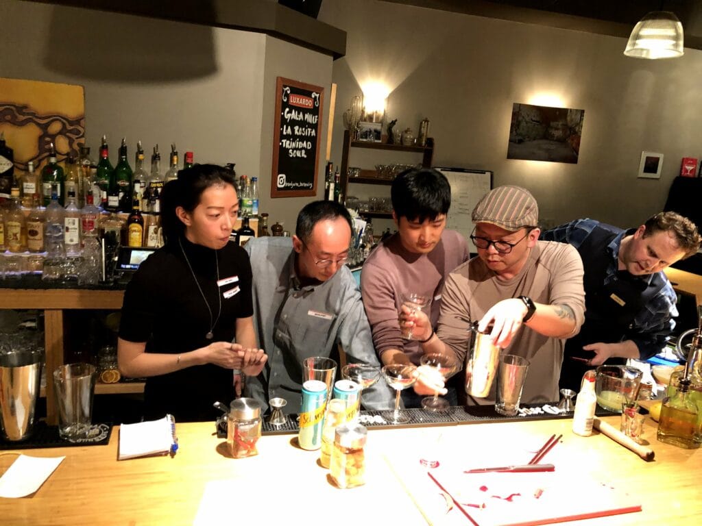 Photo of OXD staff at learning to make cocktails