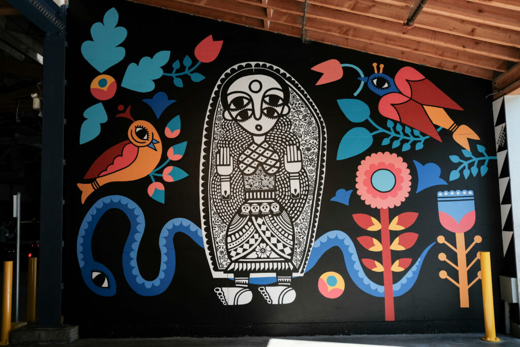 "Raise Your Words, Not Your Voice" mural by South Asian Artist Sandeep Johal