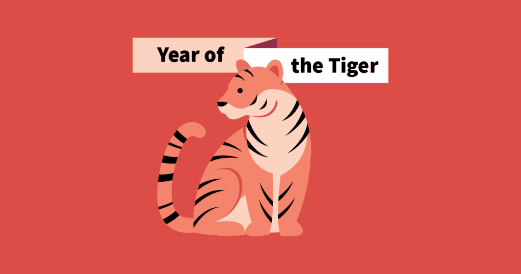 Orange background with OXD illustration of an orange and black tiger with banner saying "Year of the Tiger"