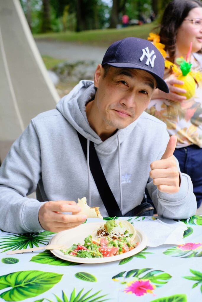 Johnny smiling with thumbs up