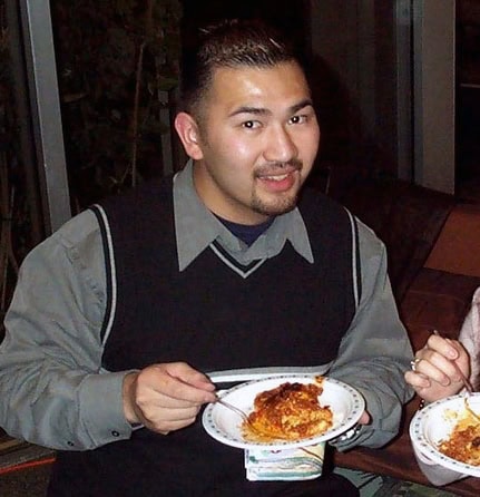 Lawrence Chan, our Senior System Administrator, has been with us from the start. Shown here at our first company party in an apartment community room, December 8, 2001.