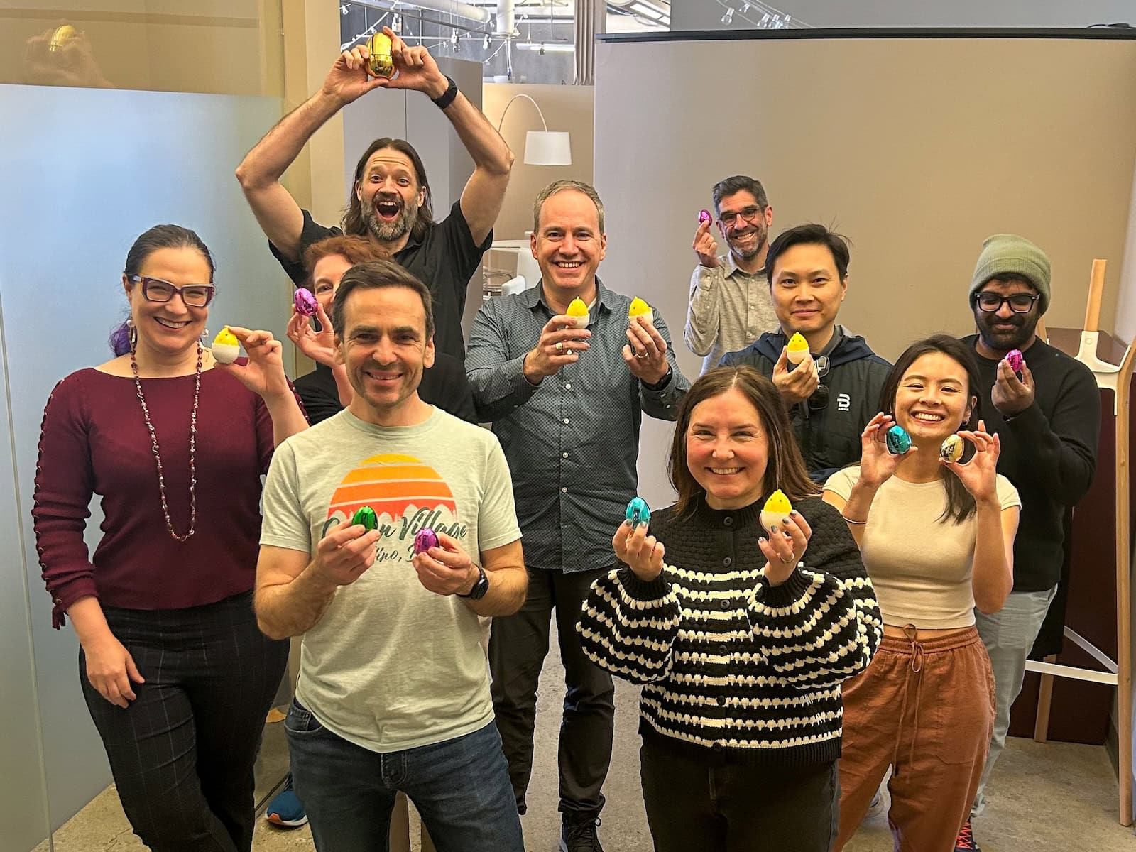 Photo of OXD staff celebrating together at a workplace event for a Easter Egg Hunt.