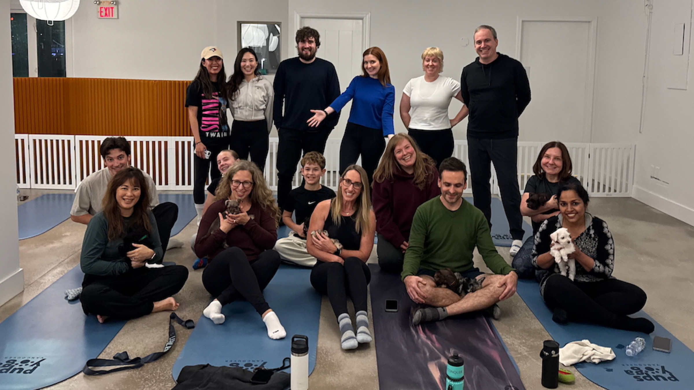 OXD and ThoughtFarmer staff at puppy yoga event